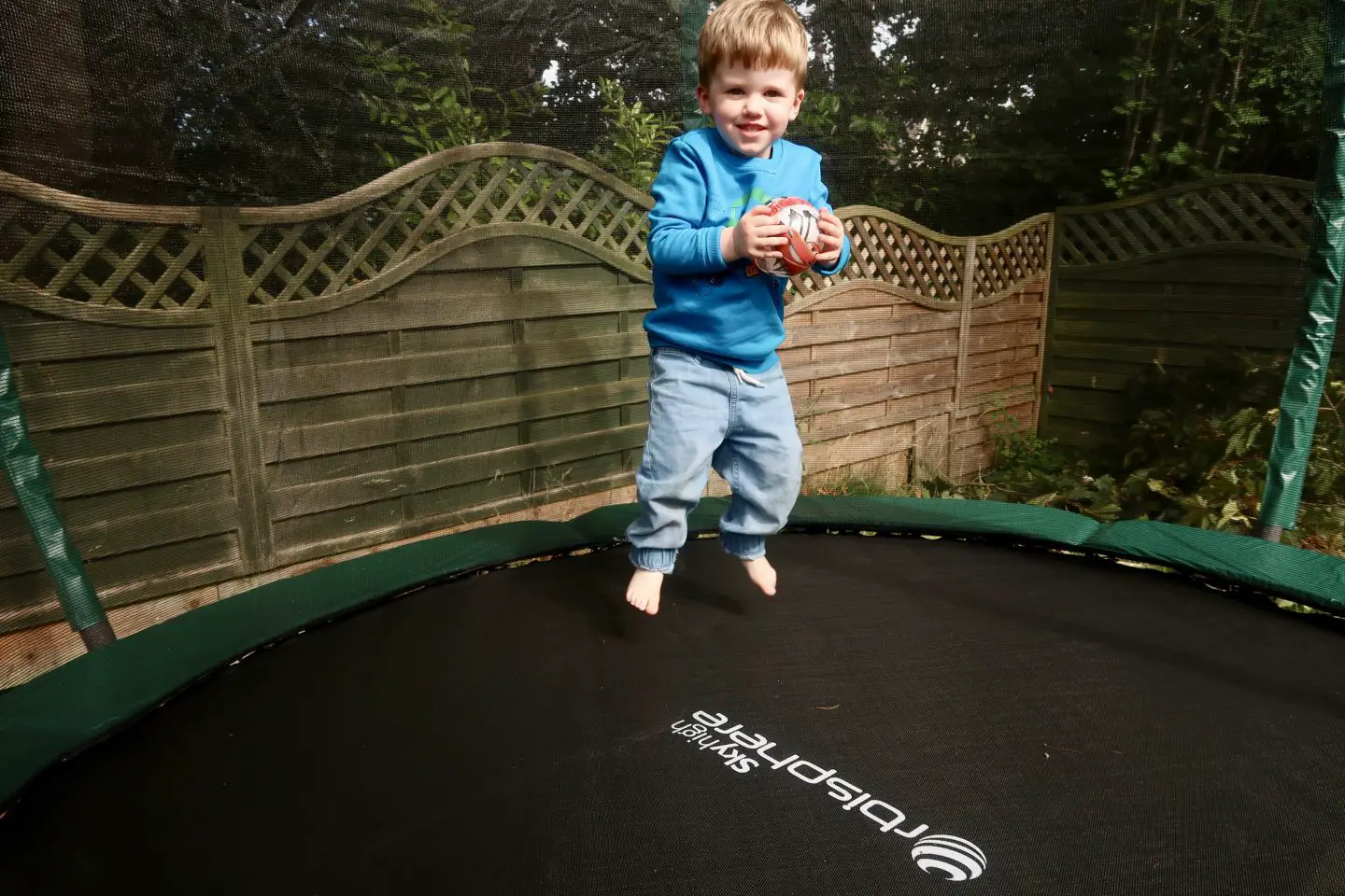 5 Ideas For Helping Your Toddler Get To Sleep | Jumping on the trampoline https://oddhogg.com