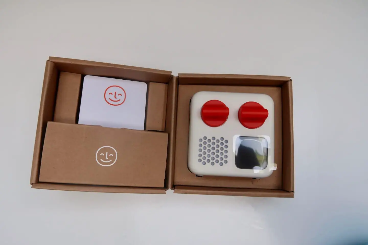 The Yoto mini box opened and showing the player and a card