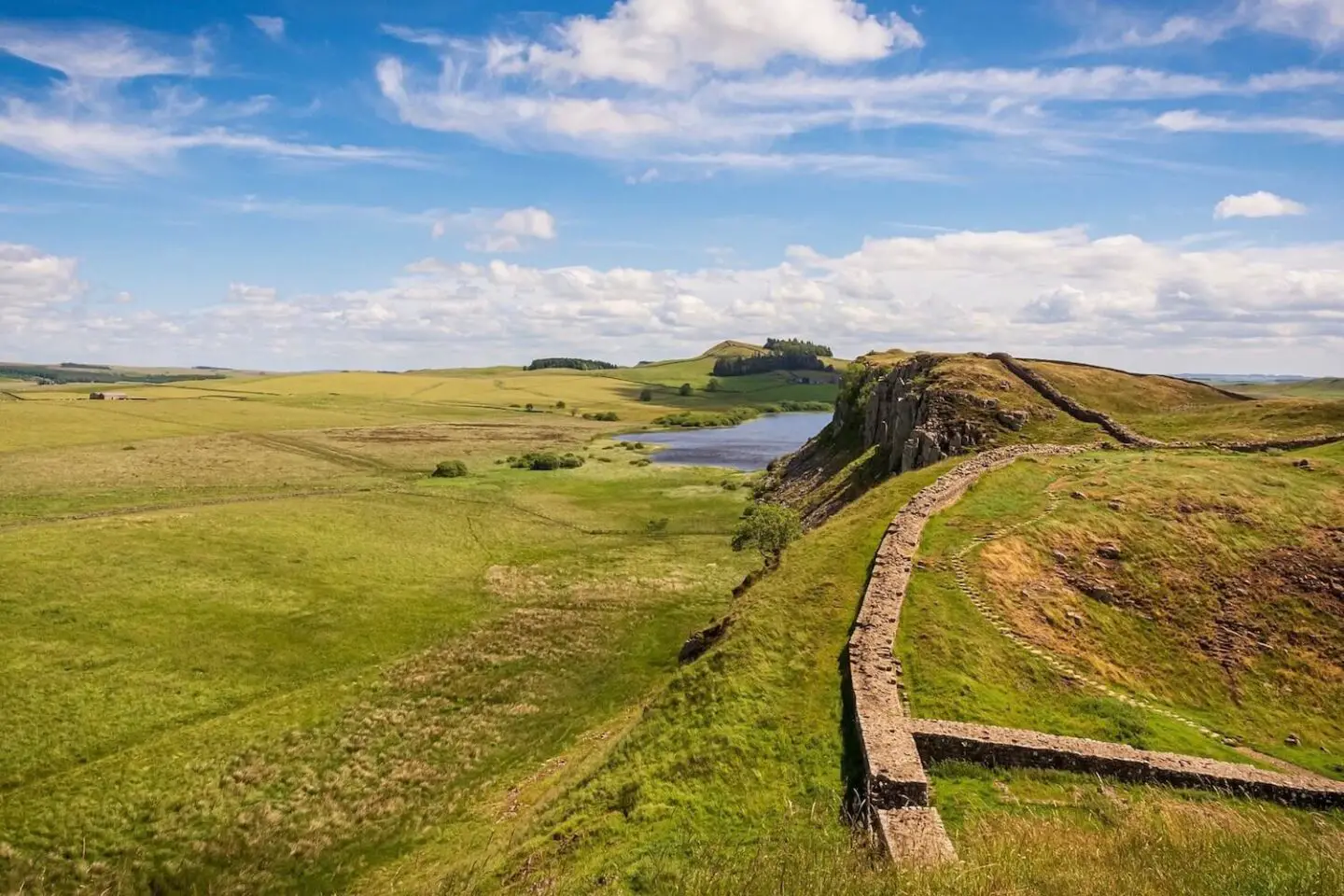 Hadrian's Wall in the countryside on a clear and bright day