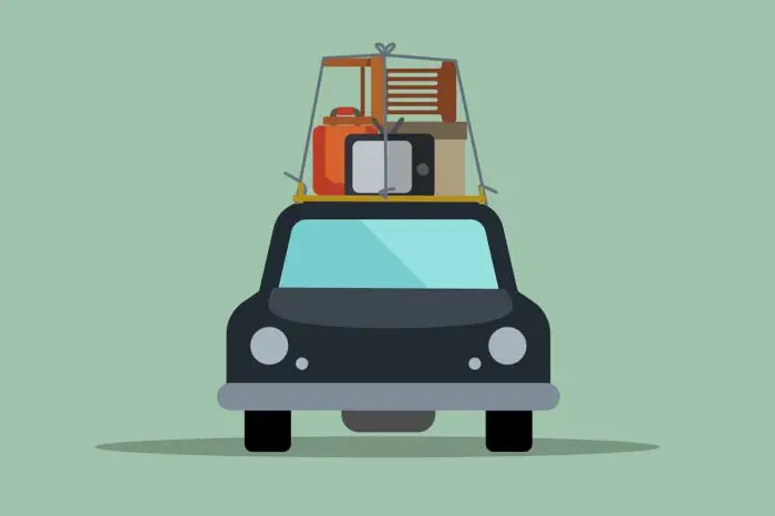 A cartoon image of a car with belongings stacked on top